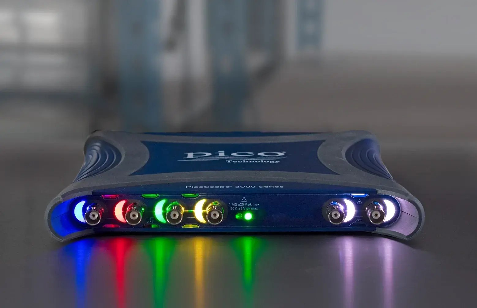 Picoscope_3000E_osciloscope_with_RGB_lights_relfecting_on_surface__1920x1920